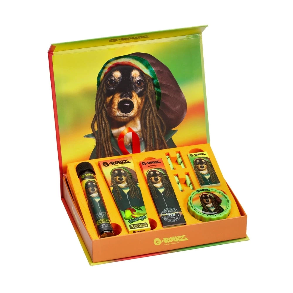 G-ROLLZ Gift Box Reggae XS, geöffnete Geschenkbox mit Reggae-Hund-Motiv und arrangiertem Set-Inhalt aus Cones, Papers, Tips, Box und Grinder